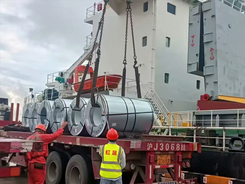 Worker shipping galvanized steel coil